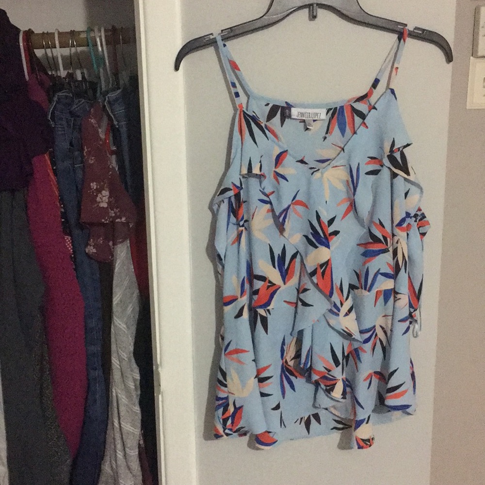 Light blue spaghetti strap top with the design